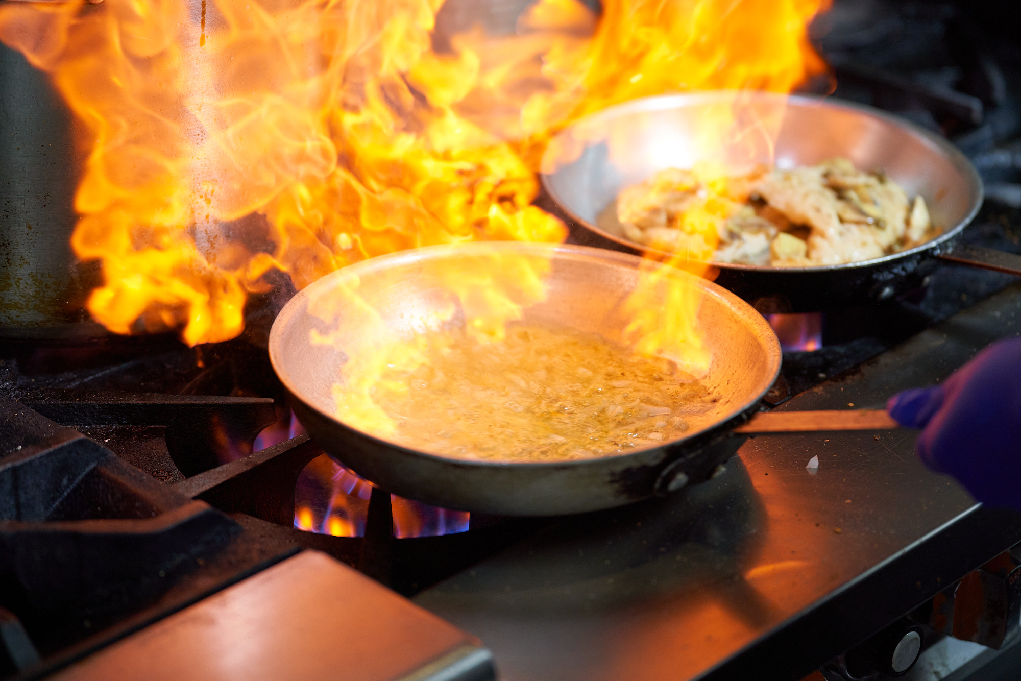 Flame-cooked pizza in the Rico's kitchen